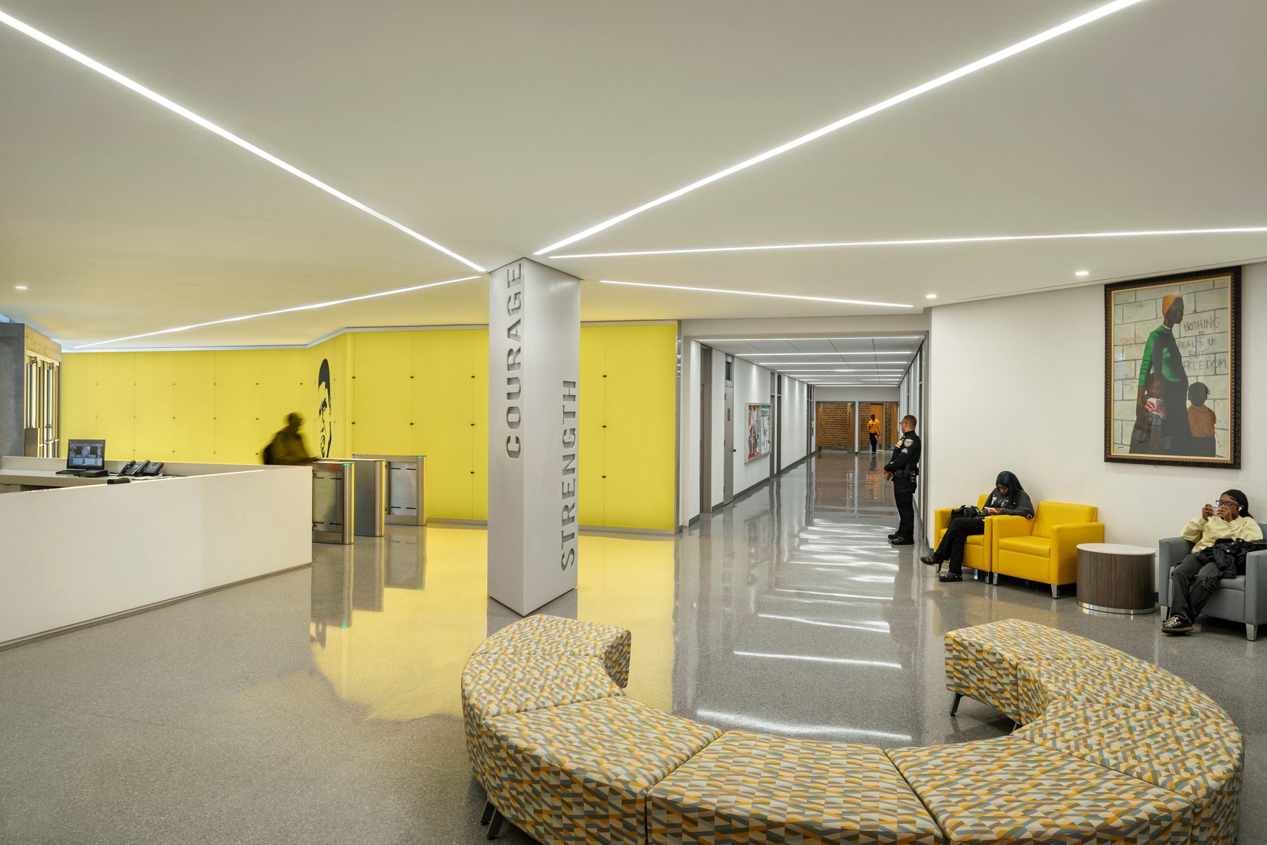 Renovated first-floor corridor and lounge seating at Medgar Evers College